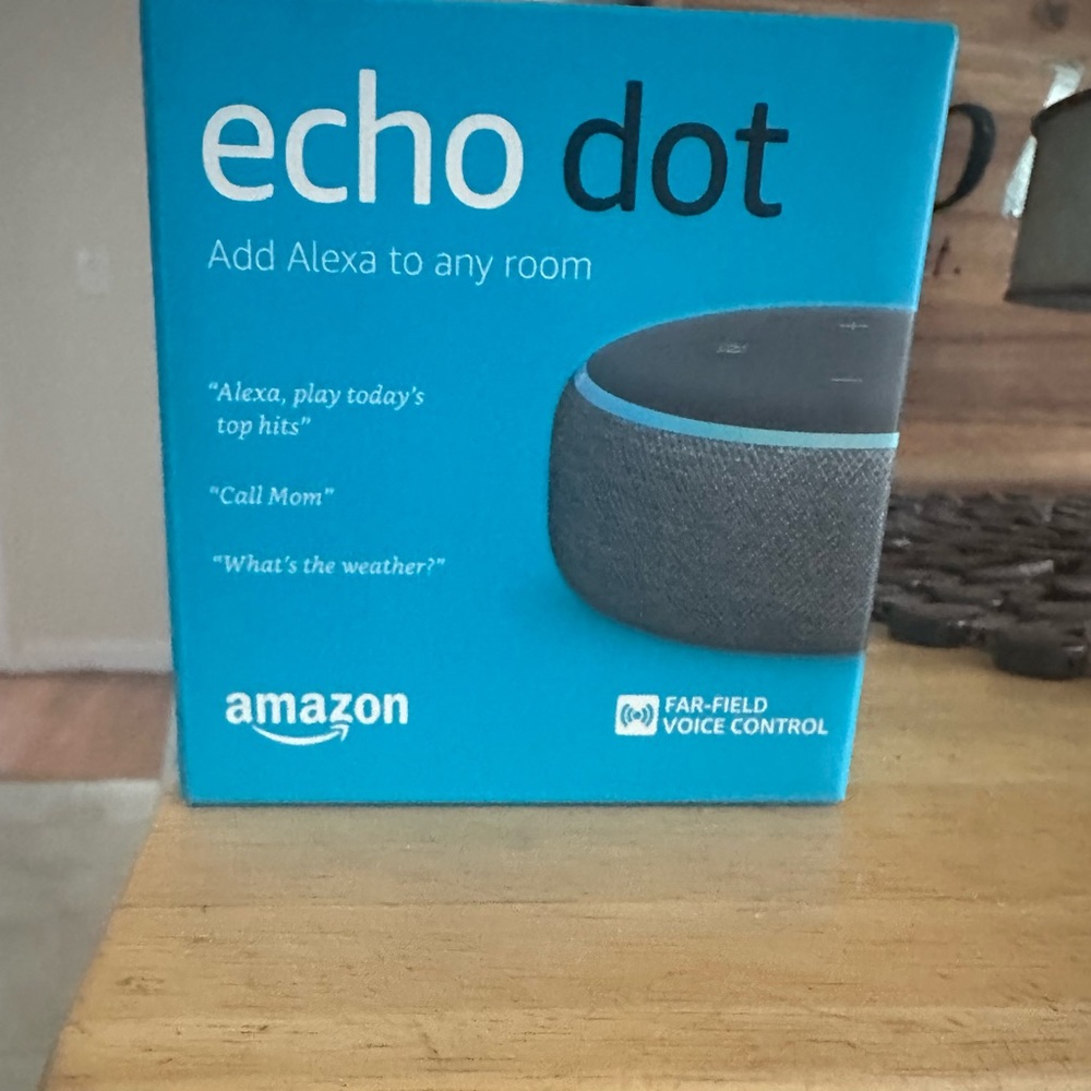 Amazon Echo Dot in Teal and Black